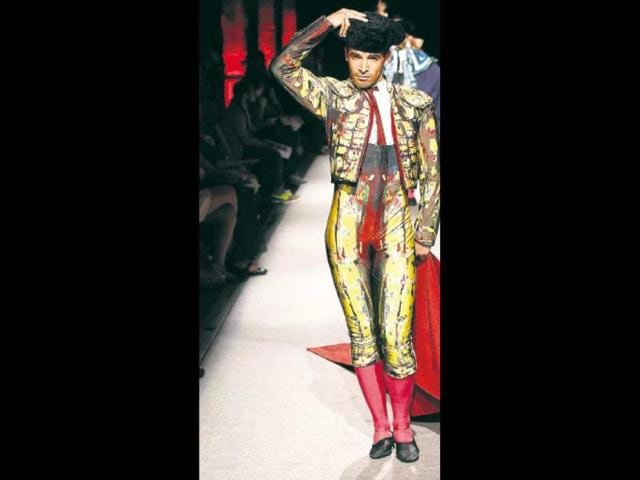 A dancer of the Spanish National Ballet dons a costume in Madrid, Spain, during a fashion show held on the occasion of the International Dance Day. (AP Photo) A dancer of the Spanish National Ballet dons a costume in Madrid, Spain, during a fashion show held on the occasion of the International Dance Day. (AP Photo)