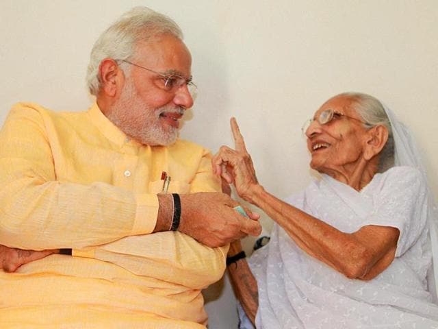 Prime Minister-designate Narendra Modi with his mother Hiraba at her residence in Gandhinagar. (PTI Photo) Prime Minister-designate Narendra Modi with his mother Hiraba at her residence in Gandhinagar. (PTI Photo)