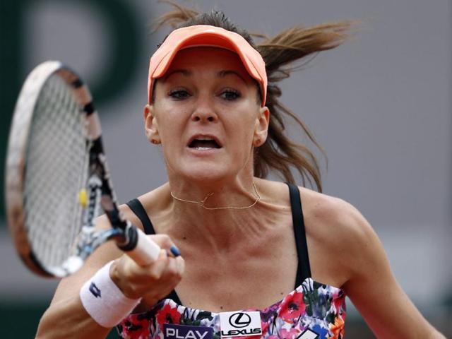 Agnieszka-Radwanska-of-Poland-in-action-during-her-first-round-match-against-Shuai-Zhang-of-China-at-the-French-Open-at-Roland-Garros-in-Paris-EPA-Photo