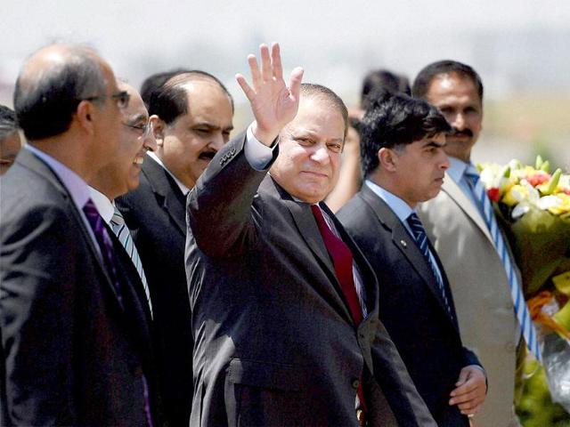 Pakistan-Prime-Minister-Nawaz-Sharif-arrives-at-AFS-Palam-to-attend-the-swearing-in-ceremony-of-Narendra-Modi-as-Prime-Minister-in-New-Delhi-on-Monday-PTI-photo Pakistan-Prime-Minister-Nawaz-Sharif-arrives-at-AFS-Palam-to-attend-the-swearing-in-ceremony-of-Narendra-Modi-as-Prime-Minister-in-New-Delhi-on-Monday-PTI-photo