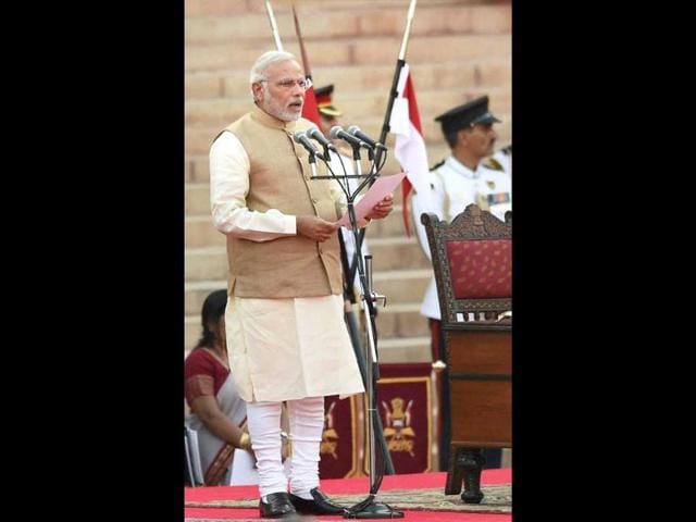 Narendra Modi takes oath as the 15th Prime Minister of India, at a ceremony at Rashtrapati Bhavan in New Delhi . (PTI photo)
