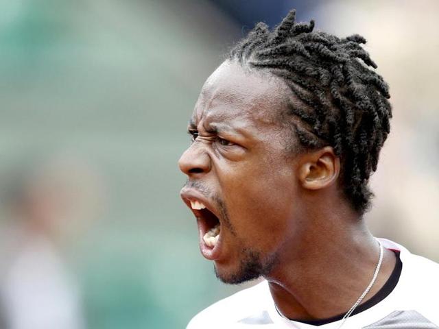 Gael Monfils of France reacts during his men's singles match against Victor Hanescu of Romania at the French Open at the Roland Garros stadium in Paris. (Reuters Photo)