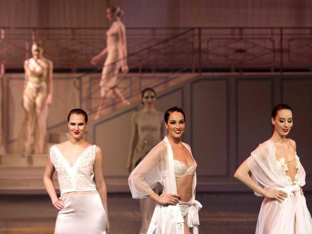 Models present creations by the French Lejaby lingerie house during a fashion show marking the 130th anniversary of the company's creation, at the Lido in Paris. (AFP)