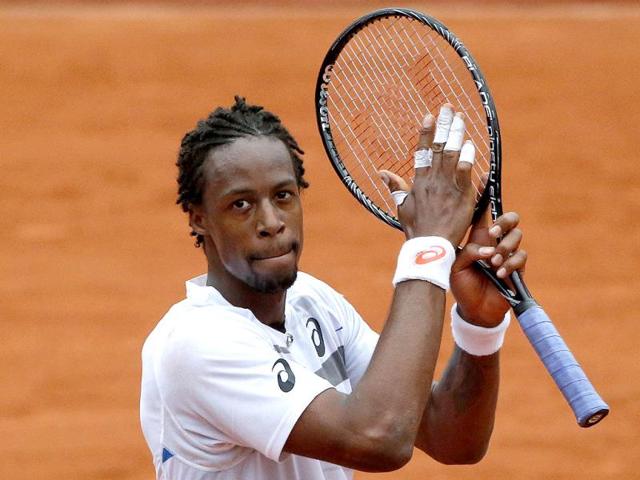 France's Gael Monfils celebrates winning his second round match of the French Open against Germany's Jan-Lennard Struff at the Roland Garros stadium in Paris. (AP Photo)