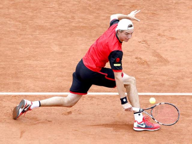 Jan-Lennard Struff of Germany in action during his second round match against Gael Monfils of France for the French Open tournament at Roland Garros in Paris. (EPA Photo)