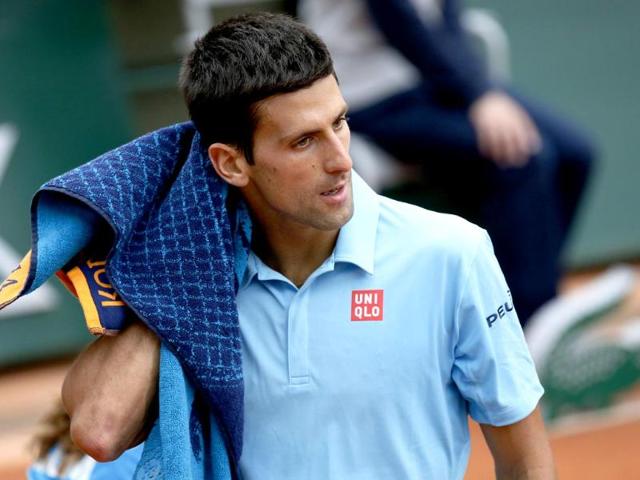 Serbia's Novak Djokovic gestures during his French Open third round match against Croatia's Marin Cilic at Roland Garros in Paris. (AFP Photo)
