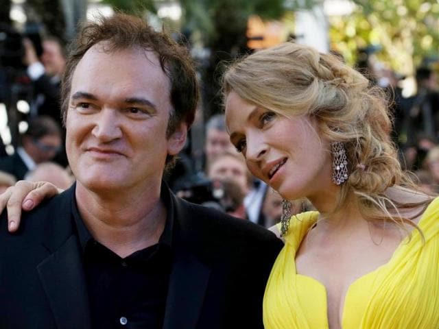 Hollywood-actor-Uma-Thurman-and-director-Quentin-Tarantino-pose-as-they-arrive-for-the-screening-of-the-film-Sils-Maria-at-the-67th-edition-of-the-Cannes-Film-Festival-AFP-Photo