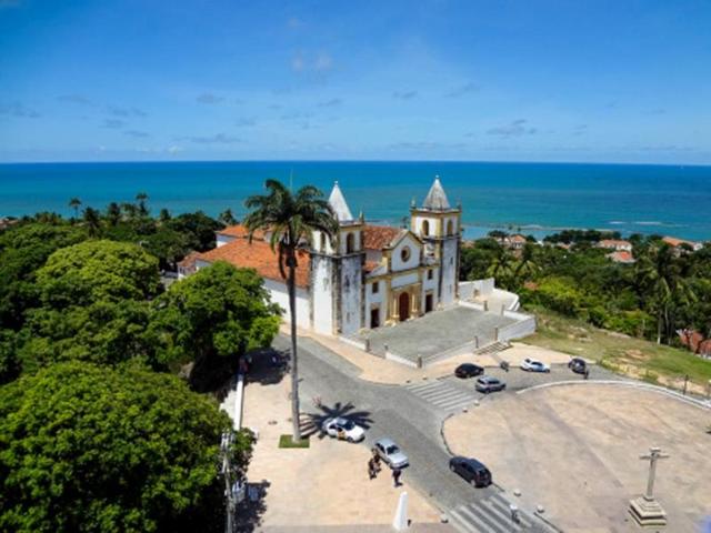 No trip to Recife is complete without a visit to its sister city Olinda, a neighboring colonial gem that was declared a World Heritage Site in 1982. One of Brazil's most festive tourist destinations, Olinda always has something afoot on its hilly, cobblestone streets. Spend the day exploring Olinda's historic churches and many art studios, nibbling on street food like tapioca along the way. For a stunning view of Recife, climb the steep Ladeira da Misericórdia, or Mercy Slope. (Getty images) No trip to Recife is complete without a visit to its sister city Olinda, a neighboring colonial gem that was declared a World Heritage Site in 1982. One of Brazil's most festive tourist destinations, Olinda always has something afoot on its hilly, cobblestone streets. Spend the day exploring Olinda's historic churches and many art studios, nibbling on street food like tapioca along the way. For a stunning view of Recife, climb the steep Ladeira da Misericórdia, or Mercy Slope. (Getty images)