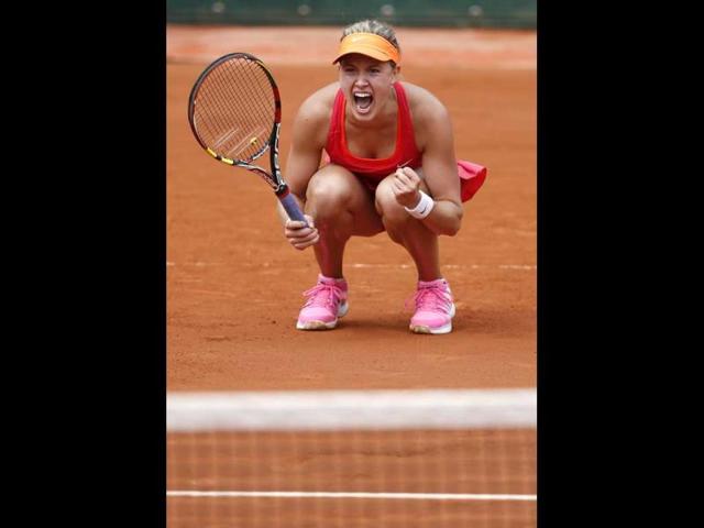 Eugenie Bouchard of Canada celebrates after beating Carla Suarez Navarro of Spain during their quarter final match for the French Open tennis tournament at Roland Garros in Paris, France (EPA Photo)