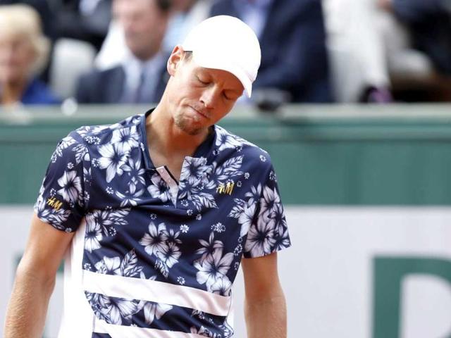 Tomas Berdych of the Czech Republic reacts during his quarter final match against Ernest Gulbis of Latvia for the French Open at Roland Garros in Paris. (EPA Photo)