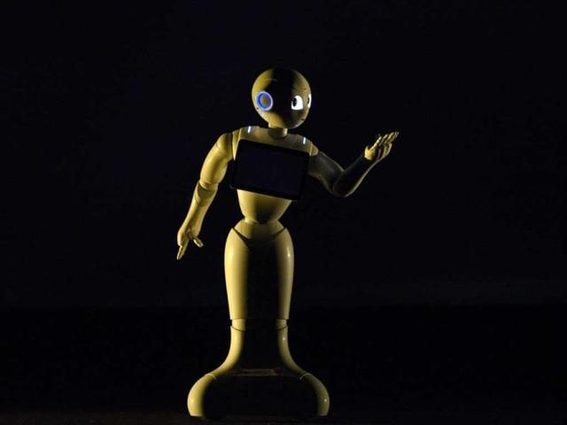 Humanoid robot 'Pepper' gestures during its unveiling at a press event held near Tokyo in Urayasu, Chiba prefecture. (EPA Photo)