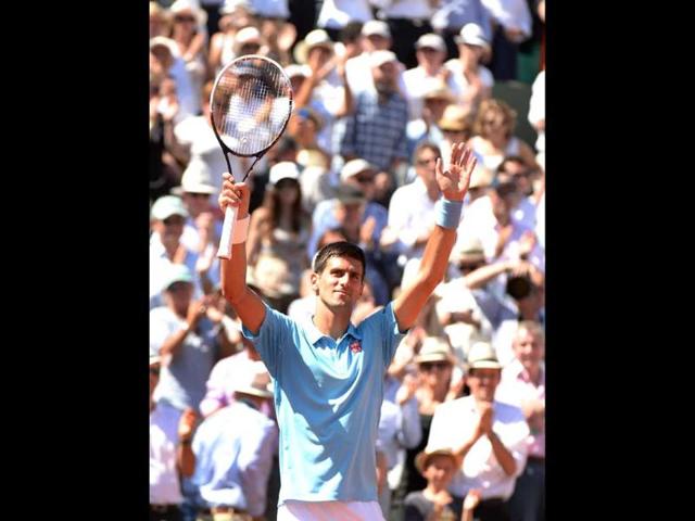 Novak Djokovic of Serbia celebrates his win over Ernests Gulbis of Latvia in their men's semi-final match during the French Open at Roland Garros in Paris. (EPA Photo)