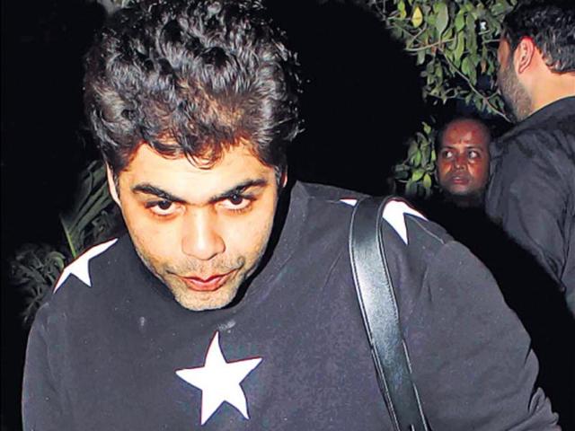 No, we didn’t catch Karan Johar readying for a sprint. The film-maker was just taking a leap outside a Bandra nightclub. (HT Photo/ Yogen Shah)