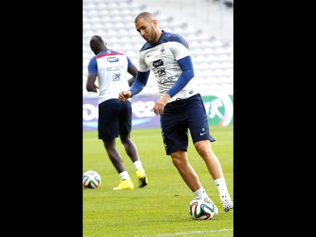 French-footballer-Karim-Benzema-controls-the-ball-during-training-session-at-the-Lille-Metropole-stadium-in-Villeneuve-d-Ascq-northern-France-AP-Photo