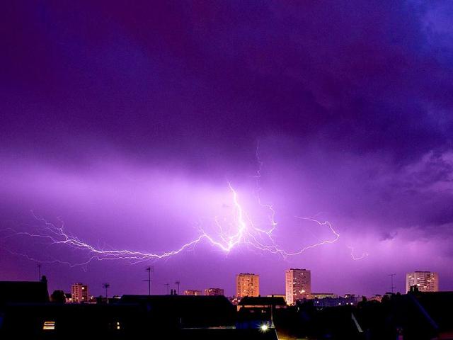 A lightning strikes during a thunderstorm over the city of Tours, central France. (AFP photo)