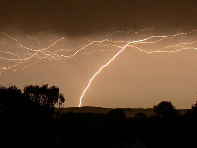 Lightning illuminates the sky as storm fronts move east near Soest, Germany. (EPA photo)