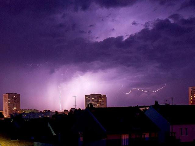 A lightning strike during a thunderstorm over the city of Tours, central France. (AFP PHOTO)