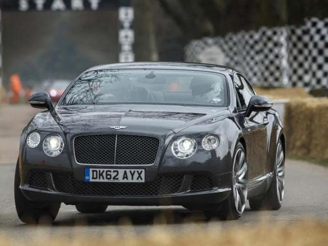 A-Bentley-Continental-GT-completes-the-Goodwood-Hill-Climb-Photo-AFP