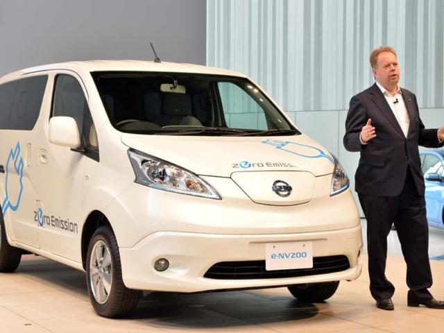 Chief-planning-officer-for-Japan-s-auto-giant-Nissan-Andy-Palmer-speaks-about-the-company-s-new-commercial-electric-vehicle-e-NV200-at-the-company-s-headquarters-in-Yokohama-suburban-Tokyo-on-June-9-2014-Nissan-will-put-the-Spanish-made-new-electric-vehicle-which-travel-190-kms-per-charge-on-to-the-Japanese-market-in-October-Photo-AFP Chief-planning-officer-for-Japan-s-auto-giant-Nissan-Andy-Palmer-speaks-about-the-company-s-new-commercial-electric-vehicle-e-NV200-at-the-company-s-headquarters-in-Yokohama-suburban-Tokyo-on-June-9-2014-Nissan-will-put-the-Spanish-made-new-electric-vehicle-which-travel-190-kms-per-charge-on-to-the-Japanese-market-in-October-Photo-AFP
