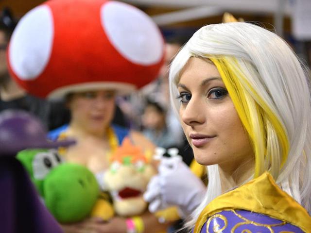 A woman dressed in costume poses as she attends the Supanova Pop Culture Expo in Sydney. (AFP photo)