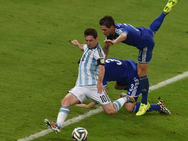 Argentina-s-forward-and-Lionel-Messi-prepares-to-kick-the-ball-to-score-his-team-s-second-goal-during-the-World-Cup-match-against-Bosnia-Hercegovina-at-the-Maracana-Stadium-in-Rio-de-Janeiro-AFP-Photo Argentina-s-forward-and-Lionel-Messi-prepares-to-kick-the-ball-to-score-his-team-s-second-goal-during-the-World-Cup-match-against-Bosnia-Hercegovina-at-the-Maracana-Stadium-in-Rio-de-Janeiro-AFP-Photo