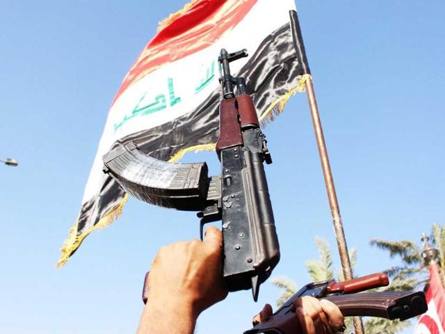 Iraqi-men-line-up-outside-of-the-main-army-recruiting-center-to-volunteer-for-military-service-in-Baghdad-Iraq-AP-PTI Iraqi-men-line-up-outside-of-the-main-army-recruiting-center-to-volunteer-for-military-service-in-Baghdad-Iraq-AP-PTI