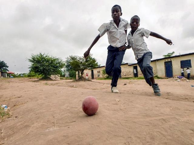 Democratic Republic of the Congo, Kinshasa: Children play football in the streets of the Kinsuka neighbourhood. (AFP Photo)
