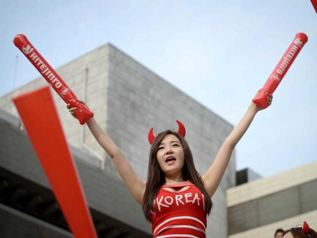 A South Korean football fan reacts during a public screening of the South Korea vs Russia football match in Seoul. (AFP Photo) 