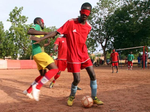 Mali, Bamako: Malian players of the Cecifoot (blind, partly sighted players) team take part in a training session at the Institut des Jeunes Aveugles (Institute for the Young Blind). (AFP PHOTO)