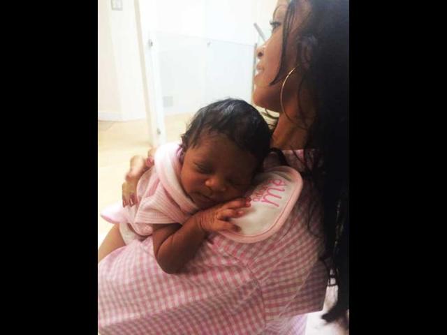 In one picture, where Rihanna is seen cradling the baby as she enjoys a nap, she wrote the caption: "Guess who fell asleep at the hospital again? #AuntyOhNaNa.