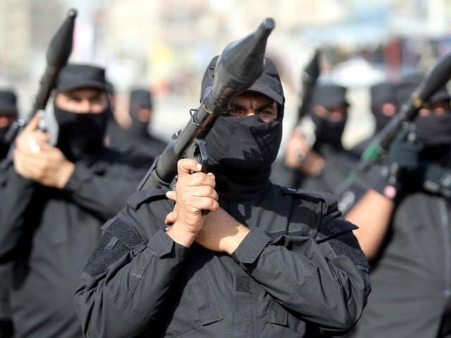 Faced-with-a-militant-offensive-sweeping-south-toward-Baghdad-Iraqi-Shiite-tribesmen-parade-with-their-weapons-in-central-Baghdad-s-Palestine-Street-AFP-Photo Faced-with-a-militant-offensive-sweeping-south-toward-Baghdad-Iraqi-Shiite-tribesmen-parade-with-their-weapons-in-central-Baghdad-s-Palestine-Street-AFP-Photo