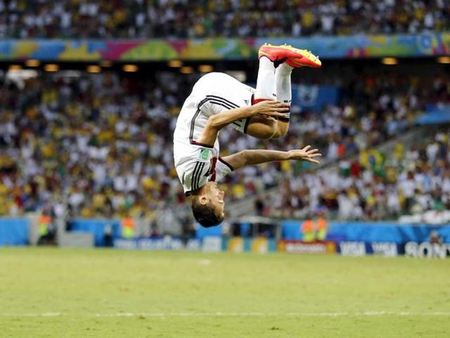 Germany-s-Miroslav-Klose-does-a-flip-as-he-celebrates-scoring-his-side-s-second-goal-during-the-Group-G-World-Cup-match-between-Germany-and-Ghana-at-the-Arena-Castelao-in-Fortaleza-Brazil-on-Saturday-AP-Photo Germany-s-Miroslav-Klose-does-a-flip-as-he-celebrates-scoring-his-side-s-second-goal-during-the-Group-G-World-Cup-match-between-Germany-and-Ghana-at-the-Arena-Castelao-in-Fortaleza-Brazil-on-Saturday-AP-Photo