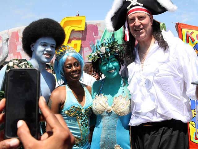 New York Mayor Bill de Blasio and his wife Chirlane McCray pose for a photograph with their children Dante de Blasio and Chiara de Blasio as they take part in the Mermaid Parade in Coney Island (AP Photo)