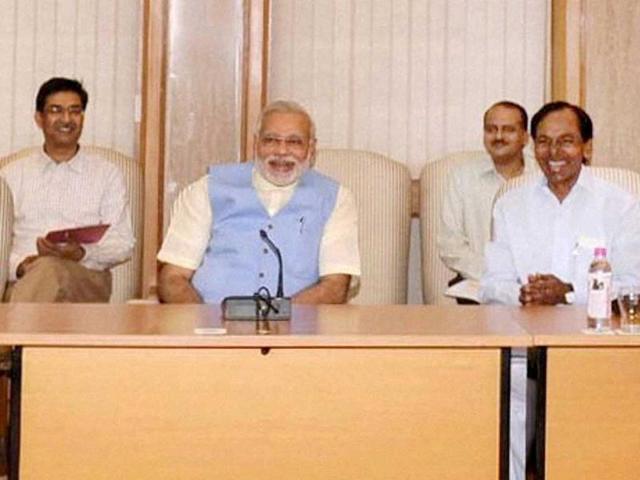 Prime Minister Narendra Modi with chief minister of the newly formed state of Telangana, K Chandrashekar Rao at a metting in New Delhi. (PTI photo)