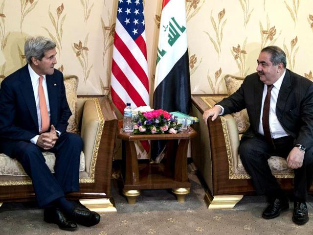John Kerry meets with Hoshyar Zebari in Baghdad. (AP photo)