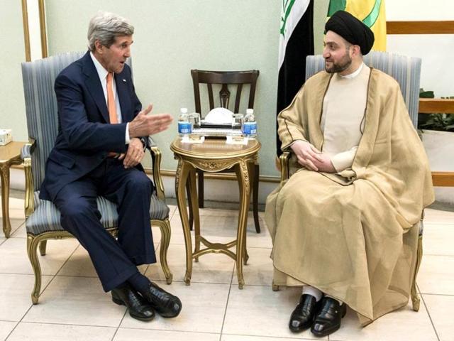 Ammar al-Hakim, head of the Islamic Supreme Council of Iraq (ISCI), meets with US secretary of state John Kerry in Baghdad. (Reuters photo)