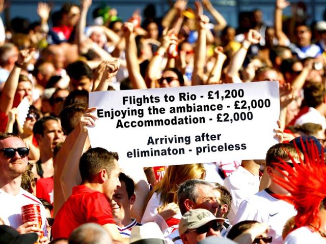 Fans-of-England-hold-up-a-sign-during-the-match-against-Costa-Rica-at-the-Mineirao-stadium-in-Belo-Horizonte-Reuters-Photo Fans-of-England-hold-up-a-sign-during-the-match-against-Costa-Rica-at-the-Mineirao-stadium-in-Belo-Horizonte-Reuters-Photo
