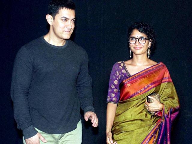 Actor Aamir Khan with his wife, film producer & director, Kiran Rao attends the Star Parivaar Awards. (PTI Photo)