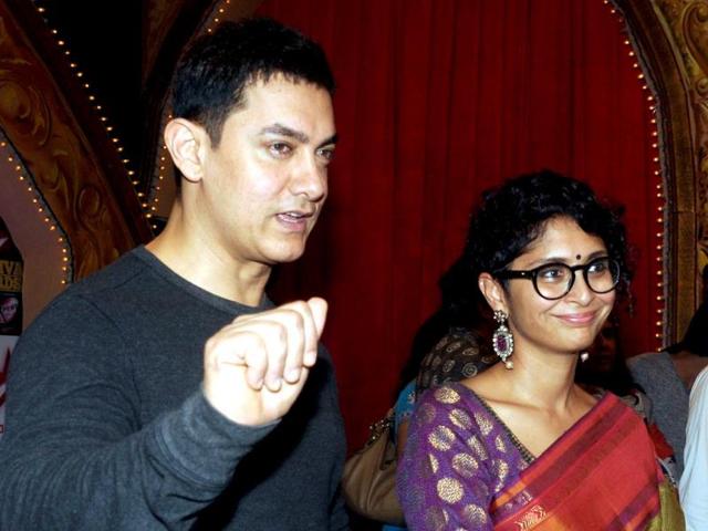Aamir Khan and film producer, screenwriter and director Kiran Rao at Star Parivaar Awards 2014. (AFP Photo)