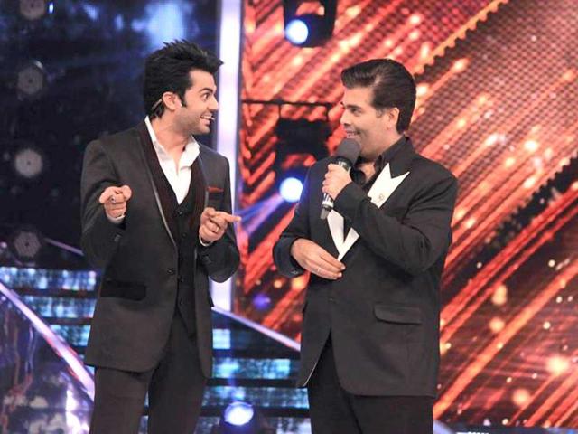 Paul here is seen in a jovial moment with Bollywood director and the show's judge Karan Johar.