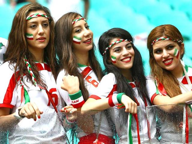 Iran fans pose during a Group F match between Bosnia-Hercegovina and Iran at the Fonte Nova Arena in Salvador. (AFP Photo) Iran fans pose during a Group F match between Bosnia-Hercegovina and Iran at the Fonte Nova Arena in Salvador. (AFP Photo)