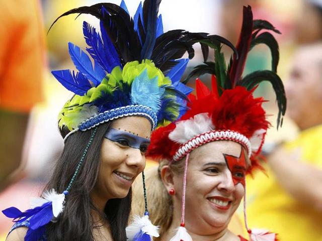 Swiss and Honduras fans attend their 2014 World Cup Group E match at the Amazonia arena in Manaus, (Reuters Photo) Swiss and Honduras fans attend their 2014 World Cup Group E match at the Amazonia arena in Manaus, (Reuters Photo)