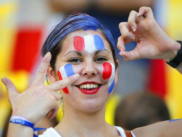 A France supporter indicates a 3-0 win prior to their Group E World Cup match against Ecuador at the Maracana stadium in Rio de Janeiro. (AP Photo) A France supporter indicates a 3-0 win prior to their Group E World Cup match against Ecuador at the Maracana stadium in Rio de Janeiro. (AP Photo)