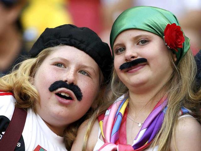 Fans wait for the start of the 2014 World Cup Group G match between Portugal and Ghana at the Brasilia national stadium in Brasilia. (Reuters Photo) Fans wait for the start of the 2014 World Cup Group G match between Portugal and Ghana at the Brasilia national stadium in Brasilia. (Reuters Photo)