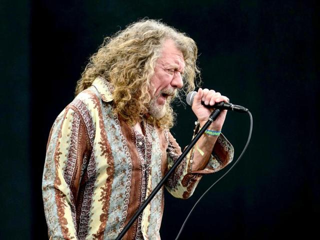 British singer Robert Plant performs on the Pyramid Stage, on the second day of the Glastonbury Festival of Music and Performing Arts in Somerset, southwest England. (AFP photo) British singer Robert Plant performs on the Pyramid Stage, on the second day of the Glastonbury Festival of Music and Performing Arts in Somerset, southwest England. (AFP photo)