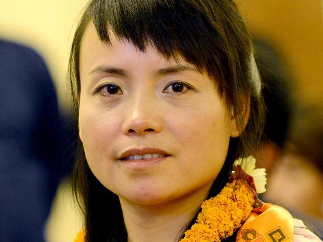 Chinese-mountaineer-Wang-Jing-the-only-climber-to-scale-Mount-Everest-from-Nepal-side-this-season-looks-on-during-an-event-to-celebrate-her-ascent-in-Kathmandu-AFP-photo Chinese-mountaineer-Wang-Jing-the-only-climber-to-scale-Mount-Everest-from-Nepal-side-this-season-looks-on-during-an-event-to-celebrate-her-ascent-in-Kathmandu-AFP-photo
