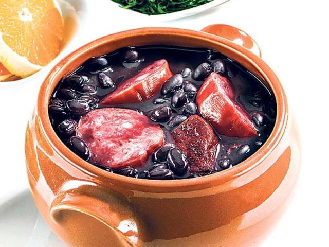 FEIJOADA, Brazil Feijoada is considered to be Brazil’s signature item. Served with steamed rice, this mix of beans, pork or beef can be consumed with vegetables too. When making the non-vegetarian dish, the &shy;vegetables are added towards the end, so they cook on steam. Some stories say that the Feijoada finds its origins in food made by the slaves in some Brazilian districts.