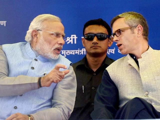 Prime Minister Narendra Modi with Jammu & Kashmir CM Omar Abdullah during the inauguration of Katra-Udhampur rail link, at Katra. (PTI photo)