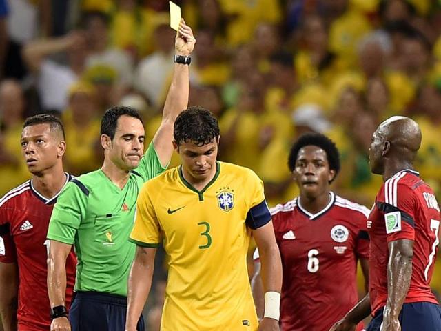 Brazil-s-defender-and-captain-Thiago-Silva-centre-receives-a-yellow-card-from-Spanish-referee-Carlos-Velasco-Carballo-during-the-quarter-final-football-match-between-Brazil-and-Colombia-AFP-Photo