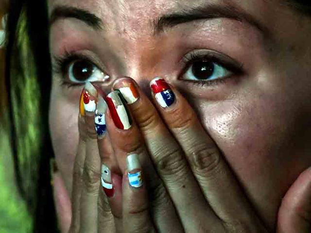 Pictures-of-Brazilian-supporters-reacting-during-the-semi-final-match-between-Brazil-and-Germany-AFP-Photo Pictures-of-Brazilian-supporters-reacting-during-the-semi-final-match-between-Brazil-and-Germany-AFP-Photo
